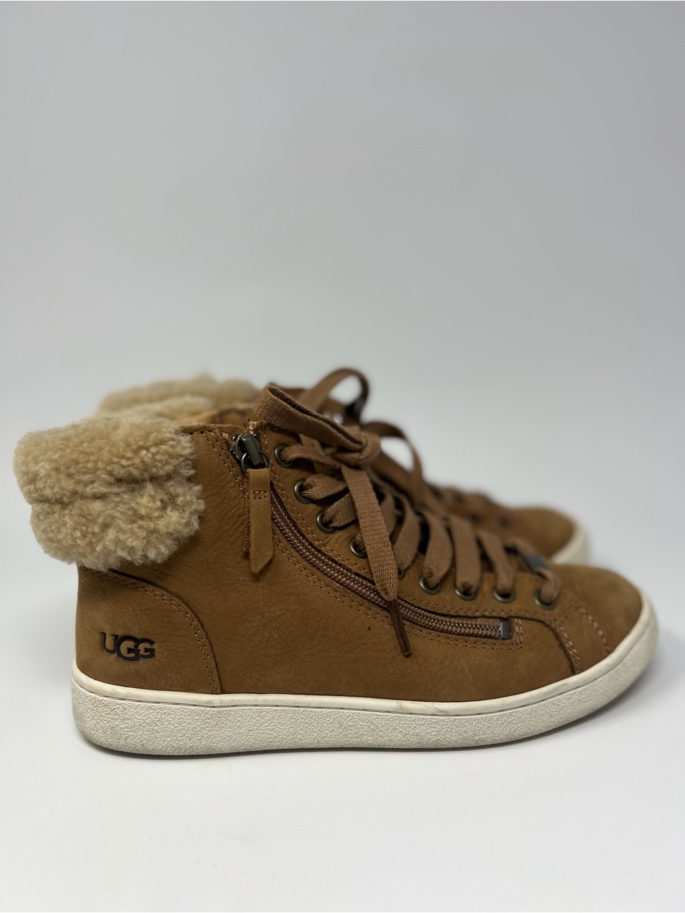 UGG High Top Sneakers
Size 7